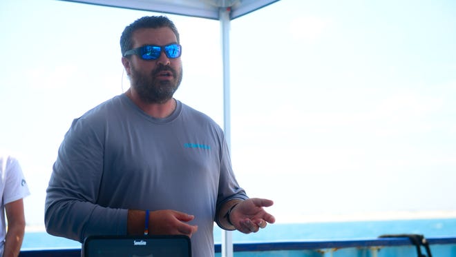 Expedition Chief Scientist Michael Hyatt from Adventure Aquarium in New Jersey aboard the OCEARCH talks about the multiple scientific research studies being conducted to learn about great white sharks on Tuesday, July 11, 2017.