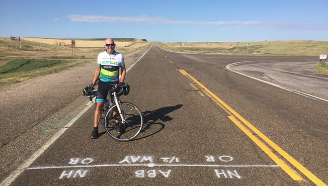 Jack Markell at the halfway point in South Dakota; he rode 115.5 miles at an average pace in a constant headwind that day.